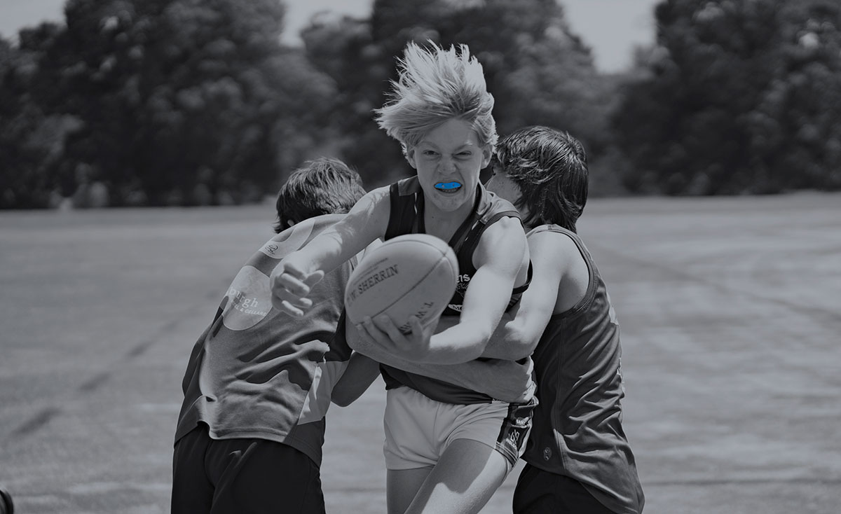Football athlete wearing Blue Neomorph Mouthguard